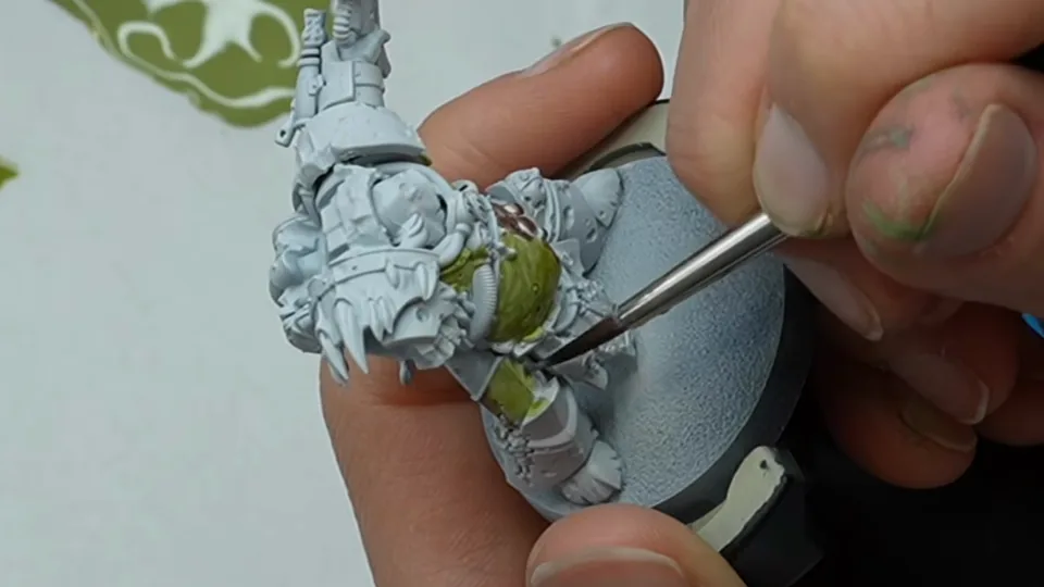 Working the first olive mixes up from the shadows on the grey-primed Death Guard miniature, Episode 03